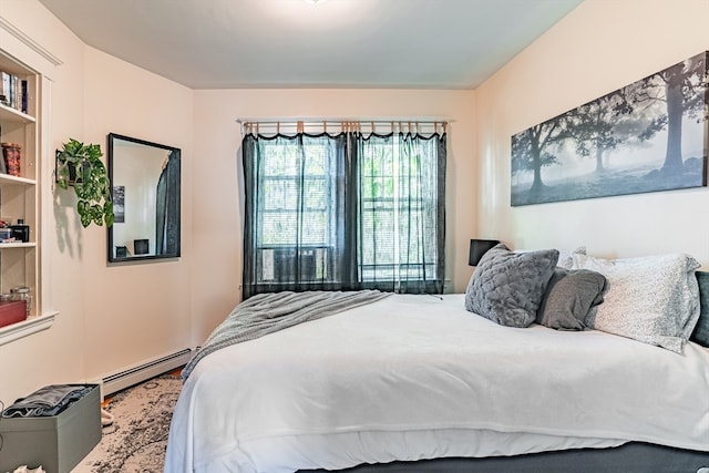 bedroom featuring a baseboard radiator