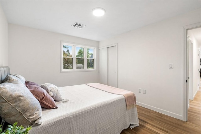 26 Parsons Dr, Swampscott, MA 01907 - bedroom featuring wood finished floors, baseboards, and a closet