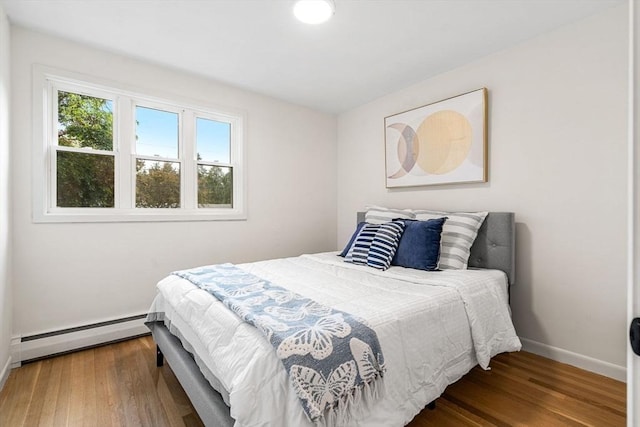26 Parsons Dr, Swampscott, MA 01907 - bedroom featuring a baseboard radiator, baseboards, and wood finished floors