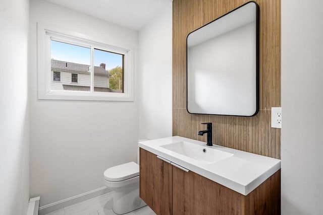 26 Parsons Dr, Swampscott, MA 01907 - bathroom with vanity, toilet, and baseboards