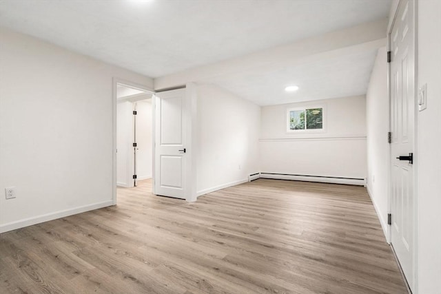 26 Parsons Dr, Swampscott, MA 01907 - spare room with baseboard heating, wood finished floors, and baseboards