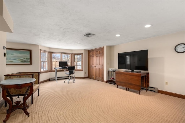 home office featuring light carpet, a textured ceiling, visible vents, and baseboards