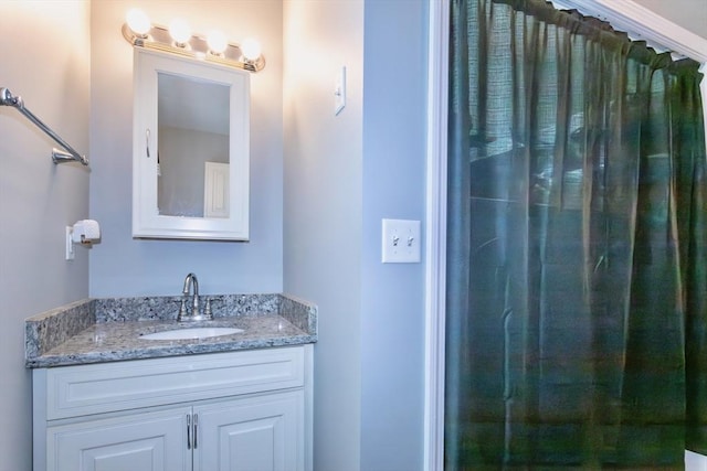full bathroom with vanity and curtained shower