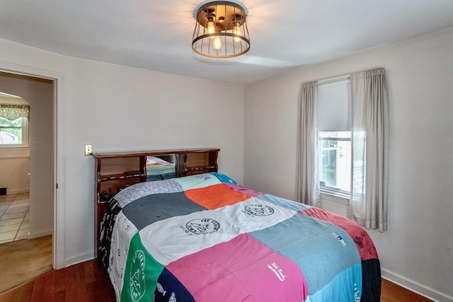 bedroom featuring baseboards