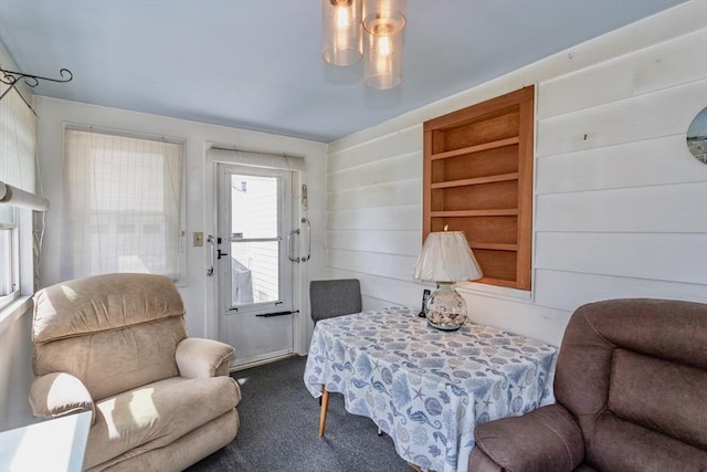 sitting room featuring carpet floors