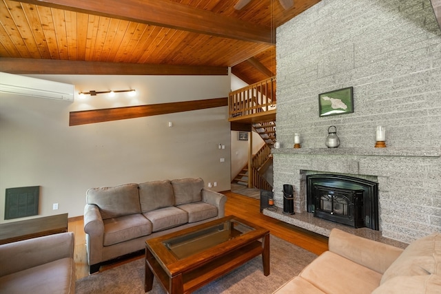 living room with wood-type flooring, vaulted ceiling with beams, an AC wall unit, and wood ceiling