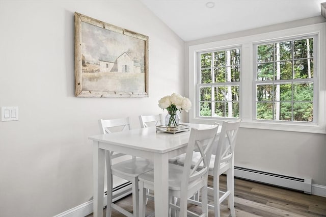 4 Rowley Rd, Topsfield, MA 01983 - dining area featuring lofted ceiling, a baseboard radiator, baseboards, and wood finished floors