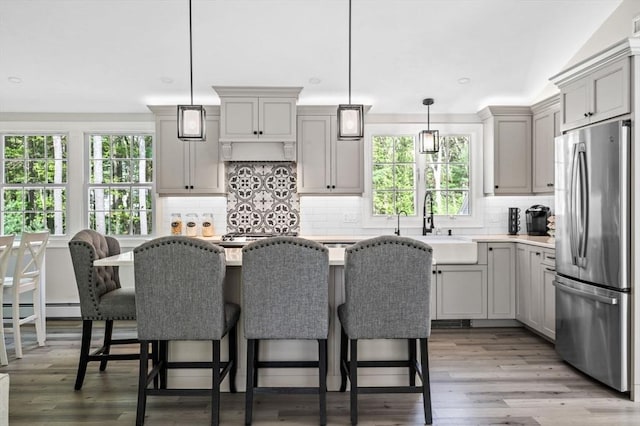4 Rowley Rd, Topsfield, MA 01983 - kitchen featuring freestanding refrigerator, plenty of natural light, light countertops, and gray cabinetry