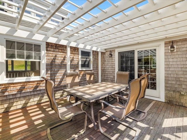 deck with outdoor dining area