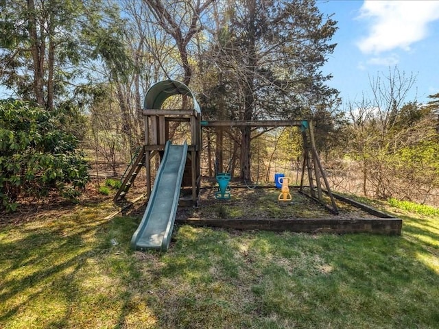 view of play area featuring a lawn
