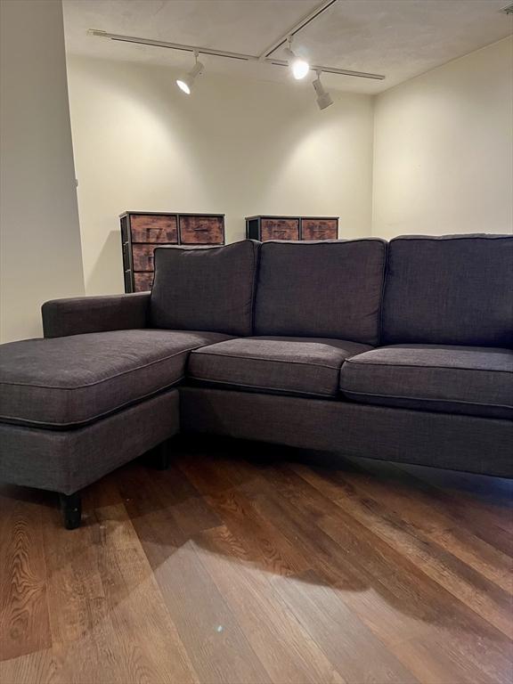 living area with wood finished floors