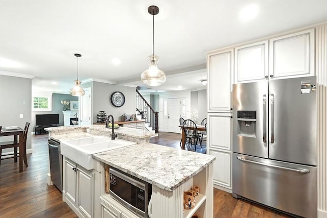 21 Carla Ln, Wilbraham, MA 01095 - kitchen featuring appliances with stainless steel finishes, a kitchen island with sink, open floor plan, dark wood-style flooring, and hanging light fixtures