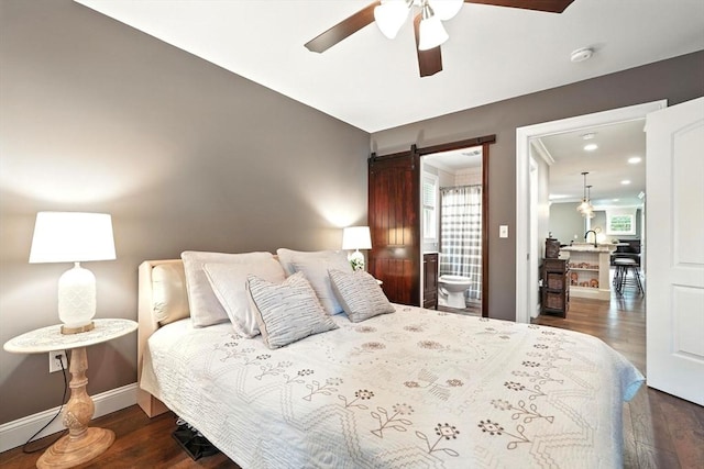 21 Carla Ln, Wilbraham, MA 01095 - bedroom featuring a barn door, dark wood finished floors, recessed lighting, ensuite bath, and ceiling fan
