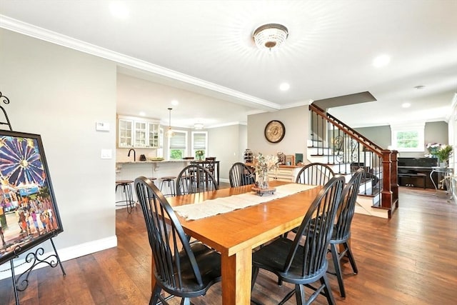 21 Carla Ln, Wilbraham, MA 01095 - dining space featuring dark wood-type flooring, stairway, crown molding, and recessed lighting