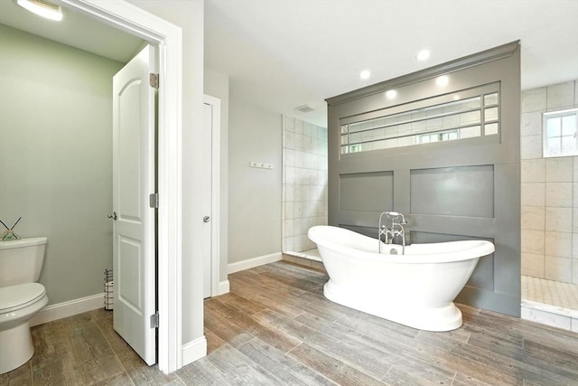 21 Carla Ln, Wilbraham, MA 01095 - full bathroom with a freestanding tub and wood finished floors
