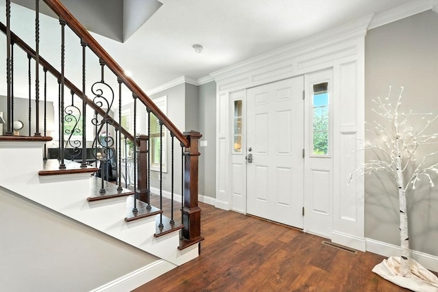 21 Carla Ln, Wilbraham, MA 01095 - entrance foyer featuring crown molding, wood finished floors, and stairway