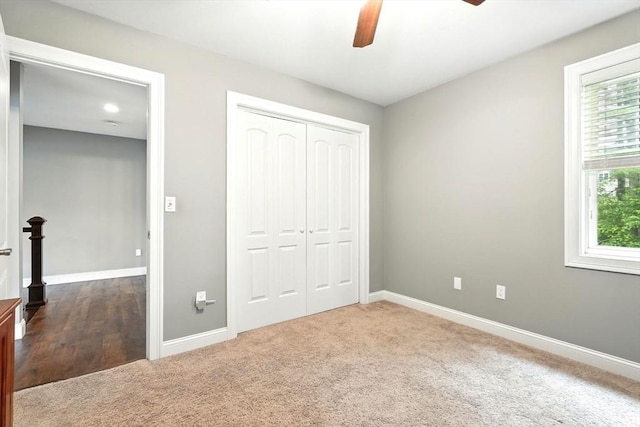 21 Carla Ln, Wilbraham, MA 01095 - unfurnished bedroom with multiple windows, a closet, carpet flooring, and a ceiling fan