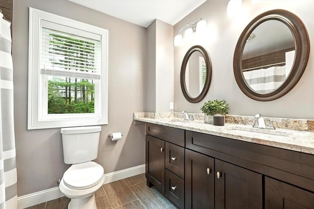 21 Carla Ln, Wilbraham, MA 01095 - full bath with double vanity and wood finished floors