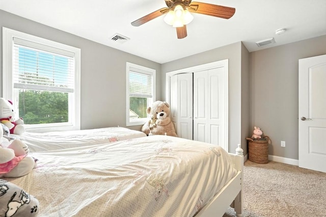 21 Carla Ln, Wilbraham, MA 01095 - carpeted bedroom with a closet and ceiling fan