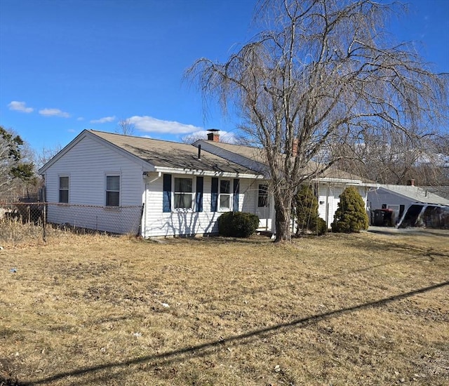 ranch-style house with a chimney