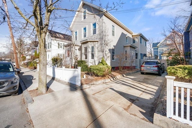 view of front of property with a fenced front yard and a residential view