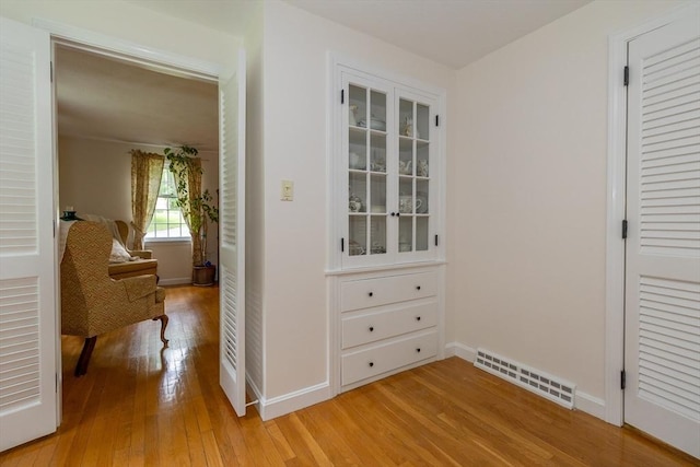 9 Horseshoe Rd, Chelmsford, MA 01824 - hallway with light wood-style flooring and baseboards