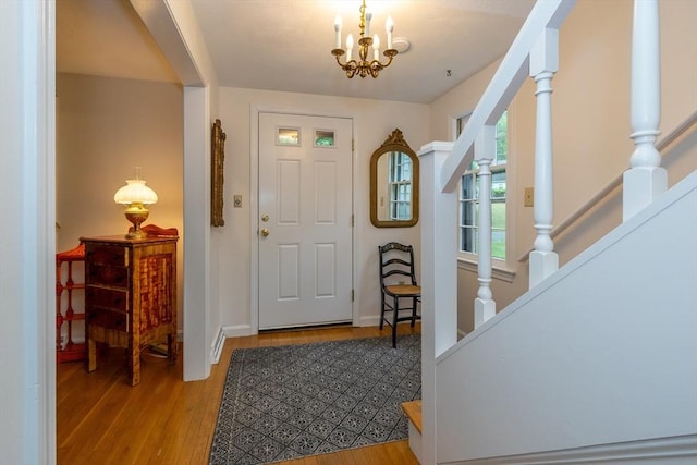 9 Horseshoe Rd, Chelmsford, MA 01824 - entrance foyer featuring light wood-style floors, stairway, and a chandelier