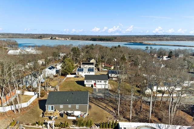 bird's eye view with a water view