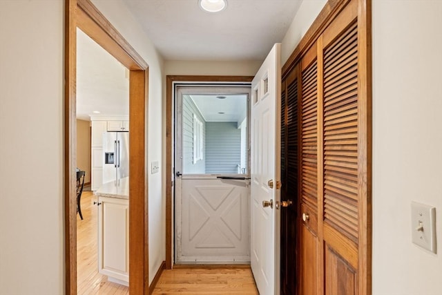 entryway with light wood-type flooring
