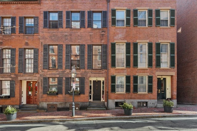 view of property featuring entry steps