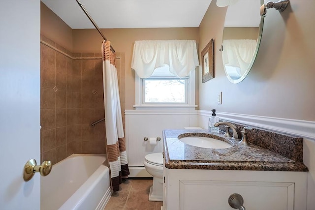 full bathroom featuring tile patterned floors, shower / bathtub combination with curtain, toilet, baseboard heating, and vanity