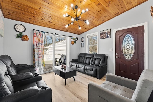 living area with wooden ceiling, light wood-style flooring, a notable chandelier, and lofted ceiling