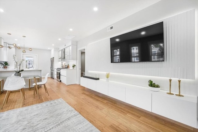 living room with light wood-type flooring