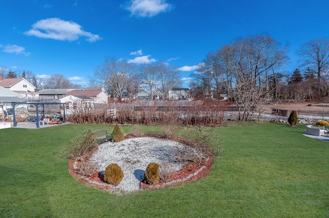 view of yard with a patio and a pergola