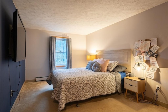 bedroom featuring carpet, a textured ceiling, and baseboard heating