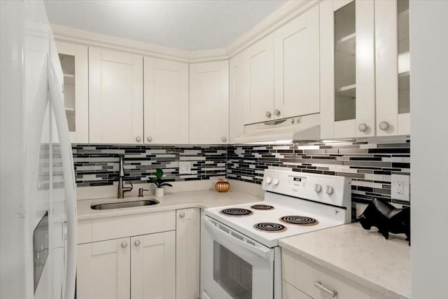 215 Winter St Unit 5R, Weymouth, MA 02188 - kitchen featuring white range with electric cooktop, under cabinet range hood, backsplash, and white cabinets
