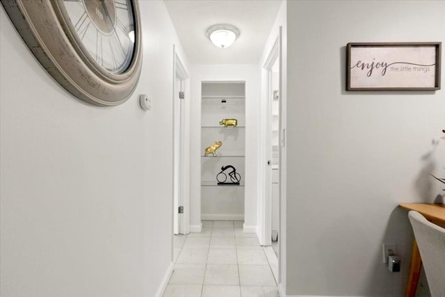 215 Winter St Unit 5R, Weymouth, MA 02188 - corridor featuring baseboards and light tile patterned floors