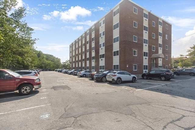 215 Winter St Unit 5R, Weymouth, MA 02188 - view of building exterior with uncovered parking