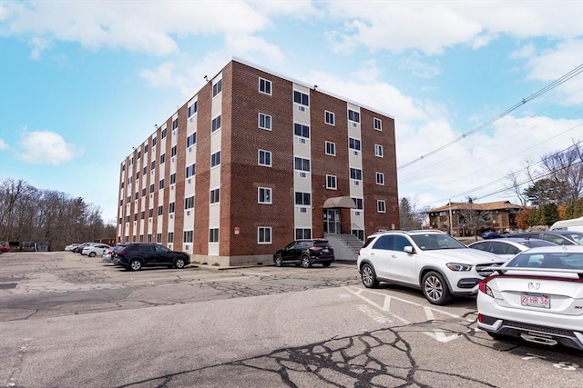 215 Winter St Unit 5R, Weymouth, MA 02188 - view of building exterior featuring uncovered parking