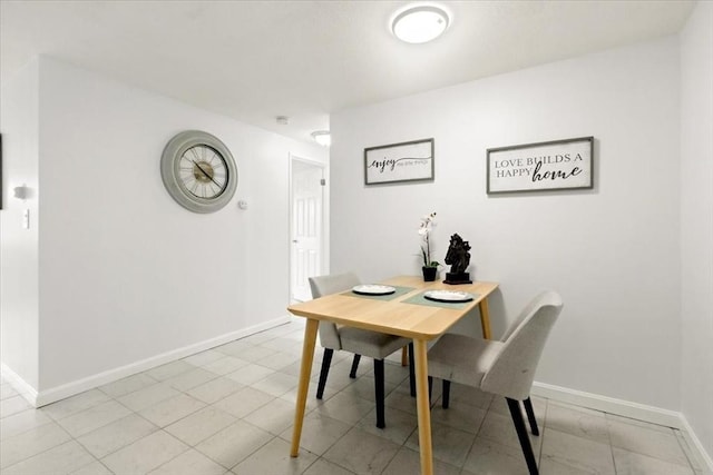215 Winter St Unit 5R, Weymouth, MA 02188 - dining room featuring baseboards