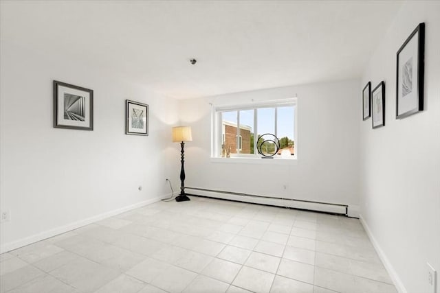 215 Winter St Unit 5R, Weymouth, MA 02188 - spare room featuring a baseboard radiator and baseboards