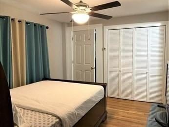 bedroom featuring ceiling fan and light hardwood / wood-style floors