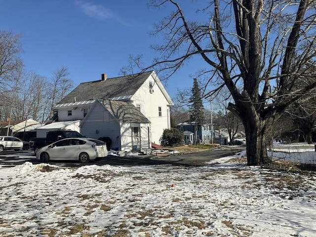 view of snow covered property