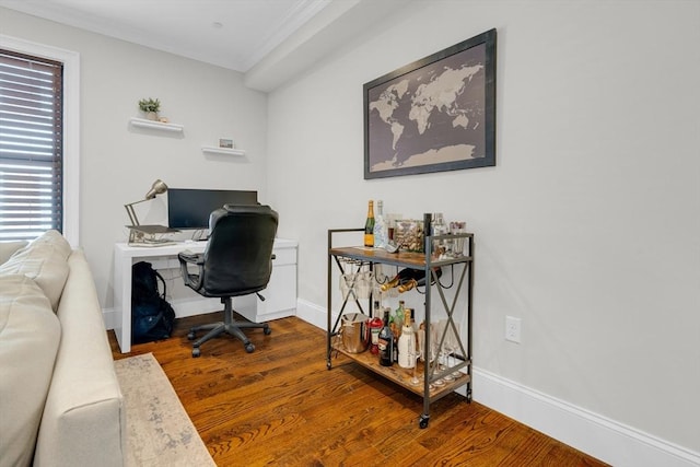 office space with hardwood / wood-style flooring and ornamental molding