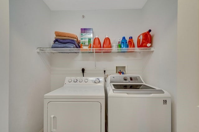 washroom featuring separate washer and dryer