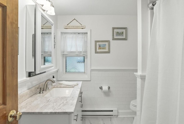 6 Hillcrest Dr, Hopkinton, MA 01748 - full bath featuring a baseboard radiator, vanity, tile walls, a wainscoted wall, and marble finish floors