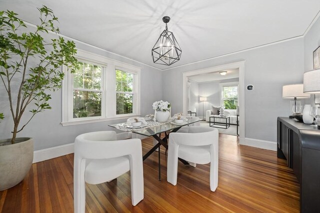 40 S Crescent Circuit, Boston, MA 02135 - dining area with baseboards, wood finished floors, and a chandelier