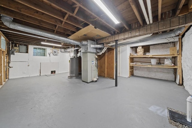 40 S Crescent Circuit, Boston, MA 02135 - basement with gas water heater, heating unit, and gas meter