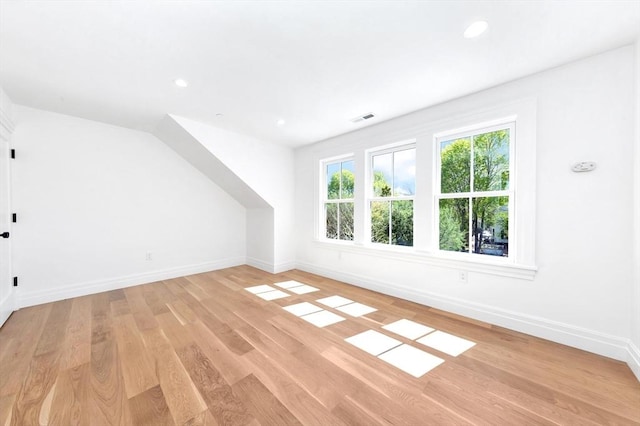 bonus room featuring recessed lighting, baseboards, visible vents, and light wood-style floors