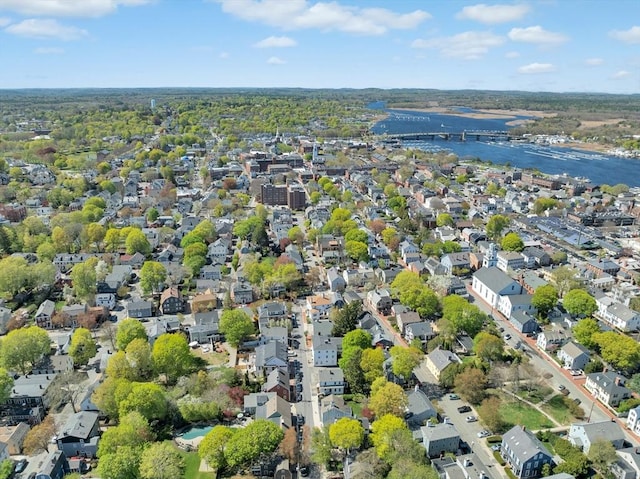bird's eye view featuring a water view and a residential view